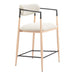 Bar stool with beige cushioned seat and backrest on a white background