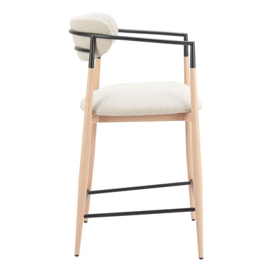 Bar stool with white cushioned seat and backrest on a white background
