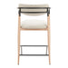 Bar stool with beige cushioned seat and backrest on a white background