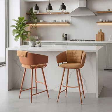 Modern kitchen with white island, brown bar stools, and light gray floor.