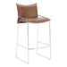 Brown leather bar stool with metal frame on a white background