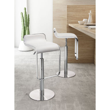 Two white bar stools with chrome bases in a modern kitchen setting.