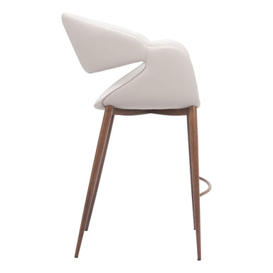 Modern chair with white cushioned backrest and wooden legs on a white background