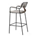 Bar stool with woven seat and backrest on a white background
