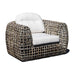 Woven chair with white cushions on a white background