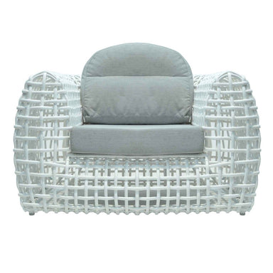 White wicker armchair with gray cushion on a white background