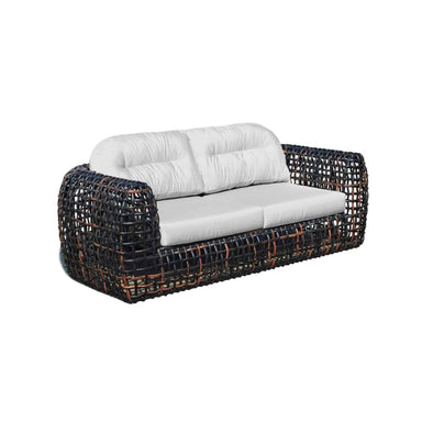 White sofa with black wicker frame on a white background