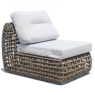 Wicker outdoor chair with white cushions on a white background
