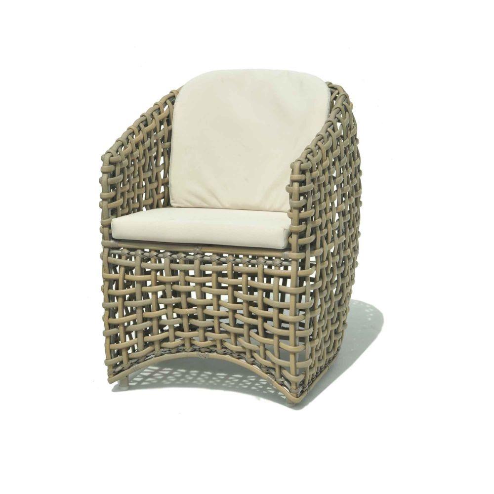 Woven chair with a white cushion on a white background