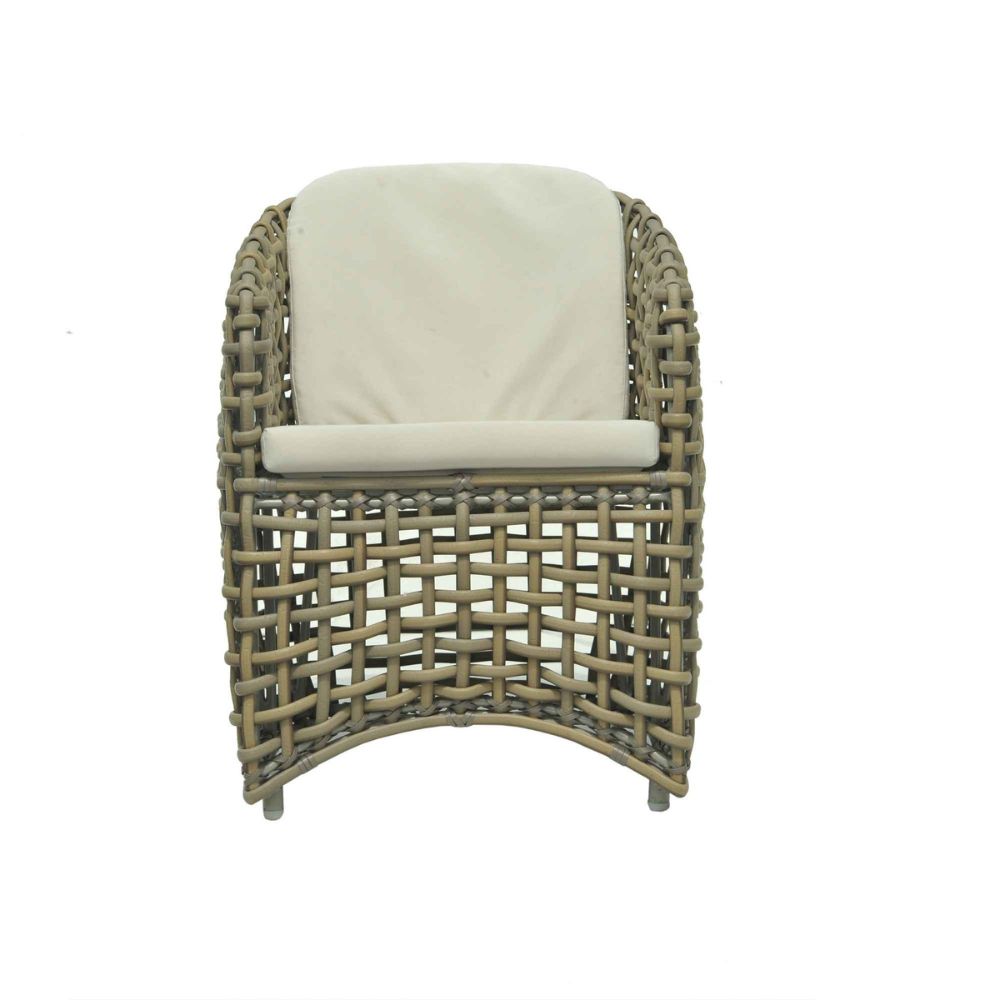 Wicker chair with a beige cushion on a white background