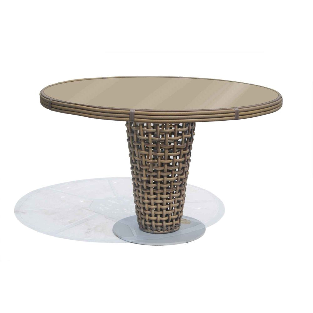 Round outdoor table with woven base on a white background