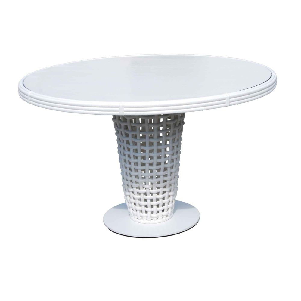 Round white table with a textured base on a white background