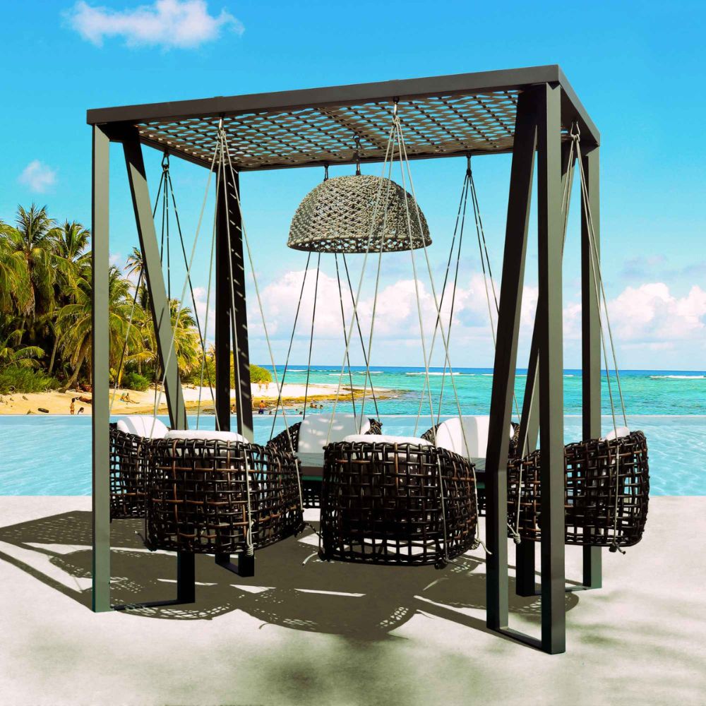 Outdoor patio set with swing and table by the beach