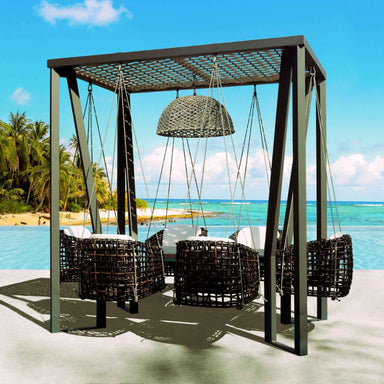 Outdoor patio set with swing and table by the beach