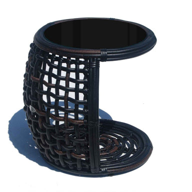 Black woven side table on a white background