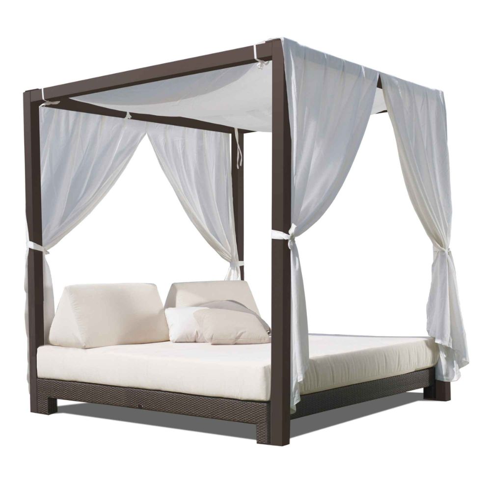 Four-poster bed with white curtains and bedding on a white background