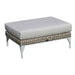 Square ottoman with woven frame and light gray cushion on a white background