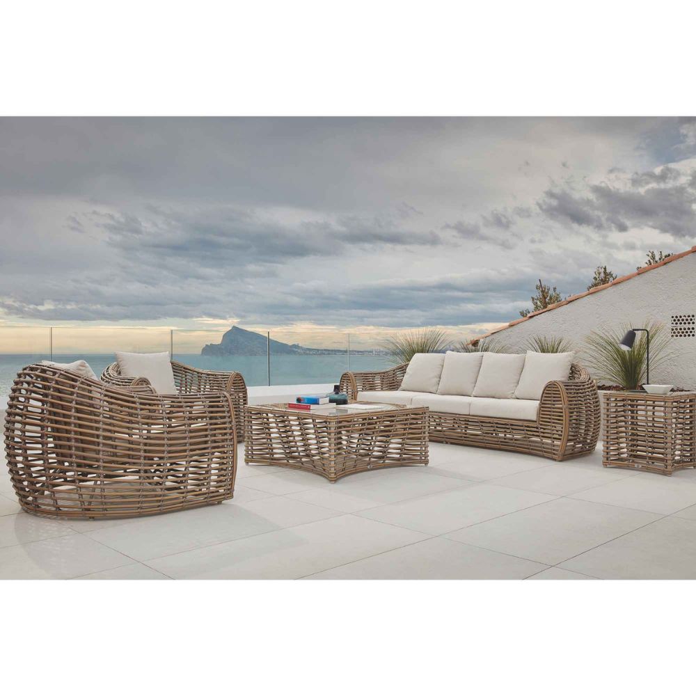 Outdoor patio furniture set with a scenic background