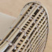 Close-up of a woven basket with a beige background