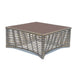 Square outdoor coffee table with woven metal frame and brown top on a white background