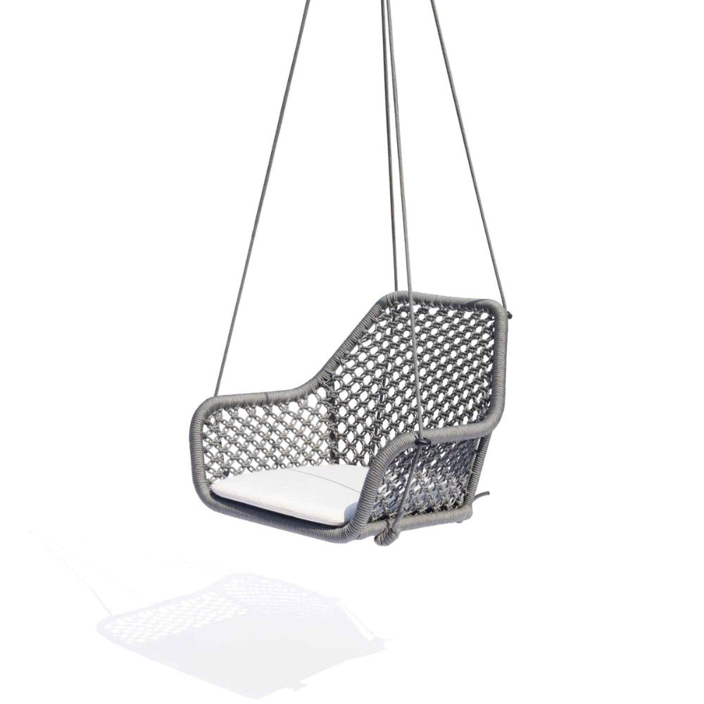Gray mesh hanging chair with white cushion on a white background