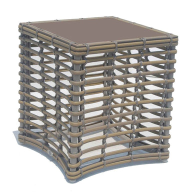 Square side table with woven design on a white background