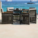 Outdoor dining set with table and chairs by the sea