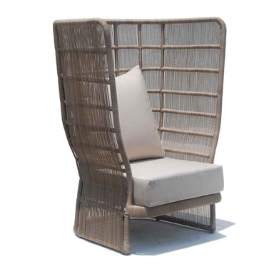 Wicker chair with a cushion on a white background