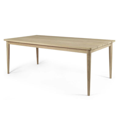 Wooden dining table on a white background