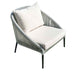 Wicker chair with white cushions on a white background