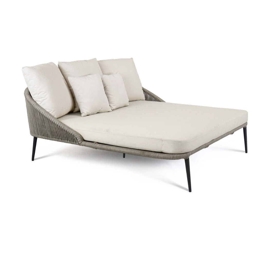 Modern outdoor lounge chair with cushions on a white background
