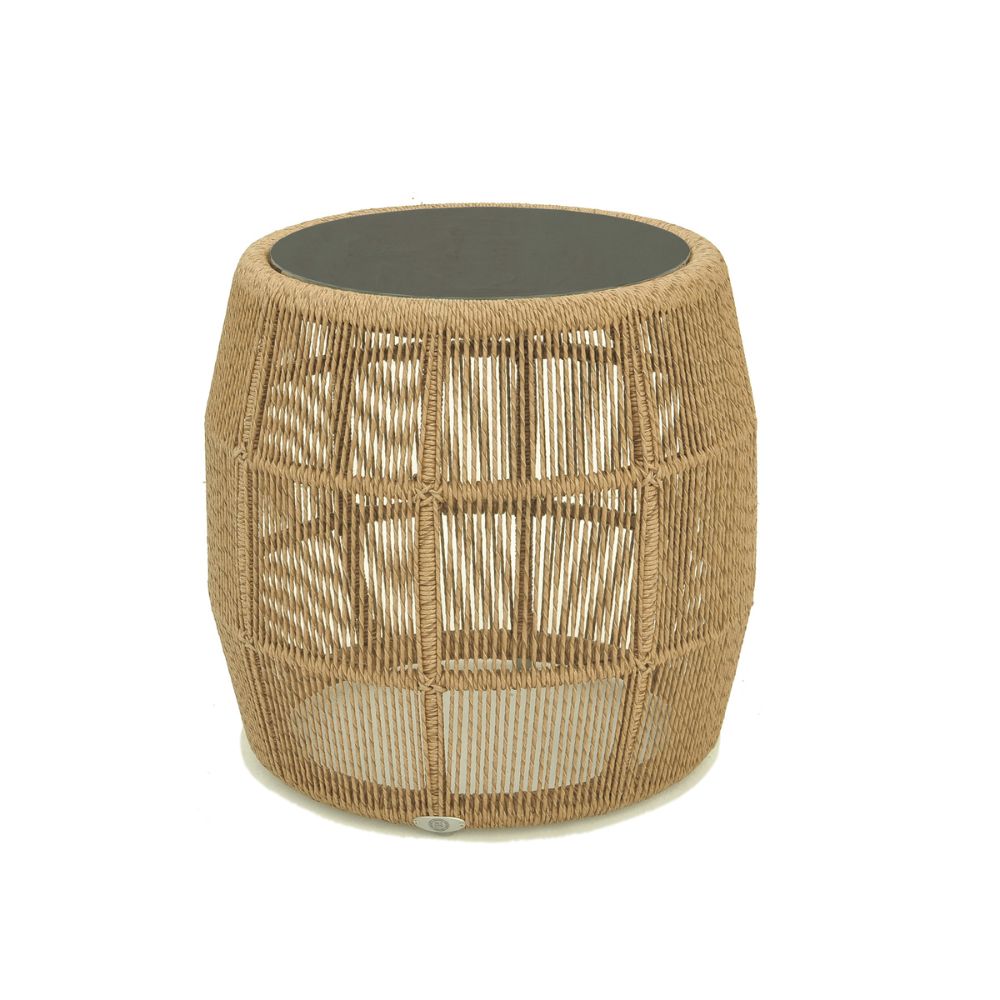 Woven side table with a black top on a white background