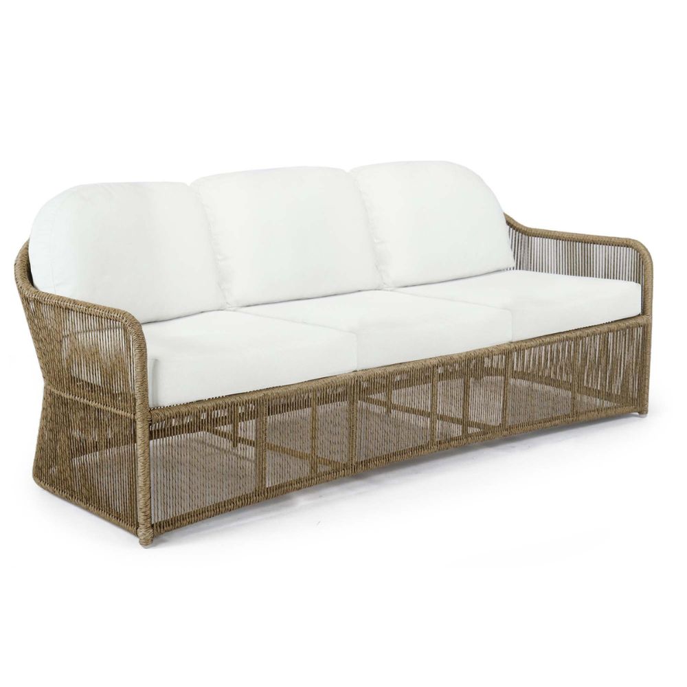Wicker outdoor sofa with white cushions on a white background