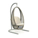 Hanging chair with beige cushion on a white background