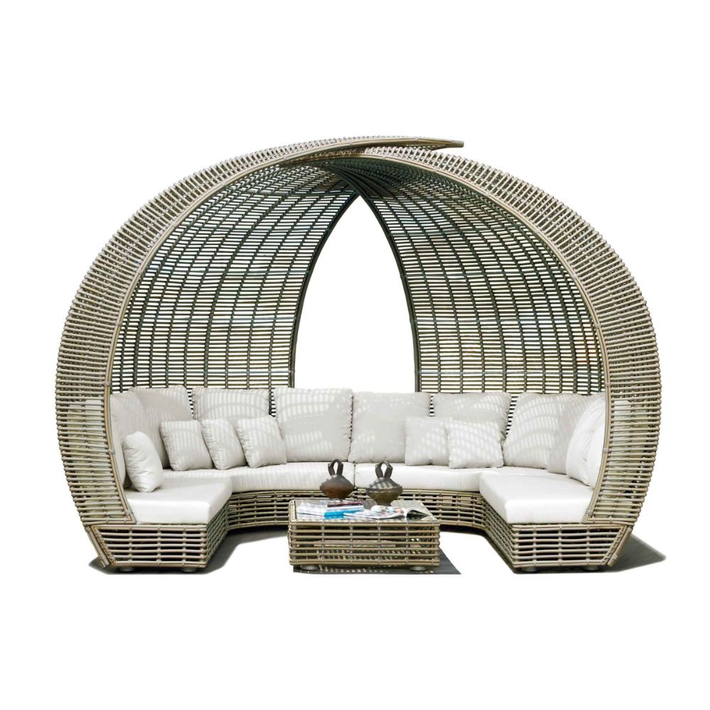 Wicker outdoor furniture set with a canopy on a white background
