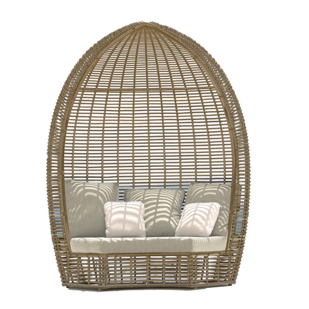Wicker egg-shaped chair with cushions on a white background