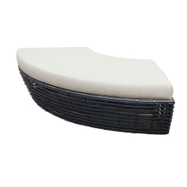 Wicker outdoor chair with a white cushion on a white background