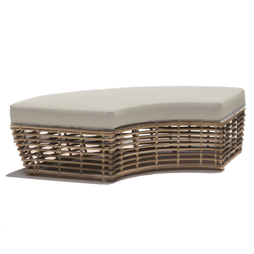 Wicker outdoor ottoman with a beige cushion on a white background