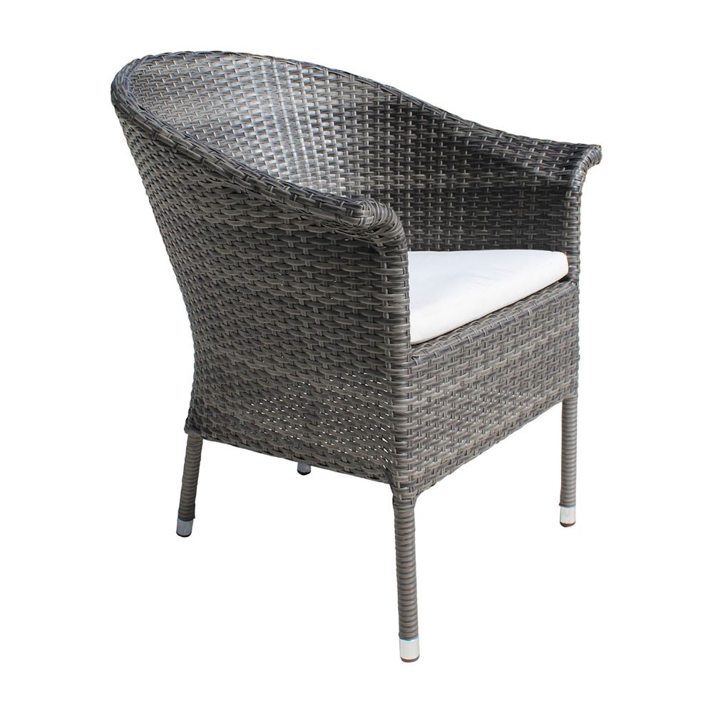 Wicker chair with a white cushion on a white background