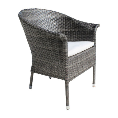 Wicker chair with a white cushion on a white background