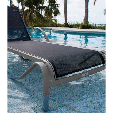 Gray lounge chair with black mesh seat by a poolside