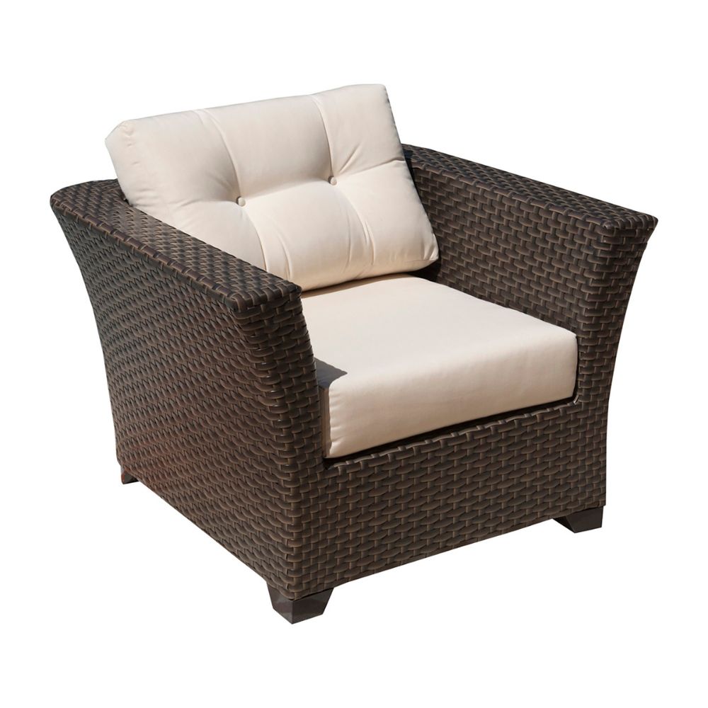 Wicker armchair with beige cushions on a white background