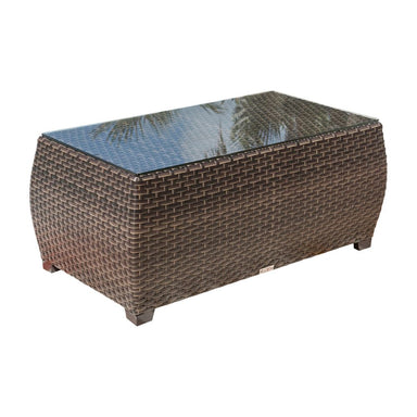Wicker coffee table with glass top on a white background
