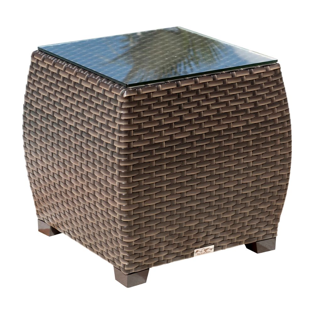 Wicker side table with glass top on a white background