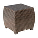 Brown woven cube ottoman on a white background