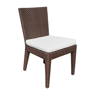 Brown wicker chair with a white cushion on a white background