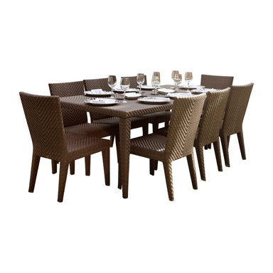 Brown outdoor dining set with table and chairs on a white background