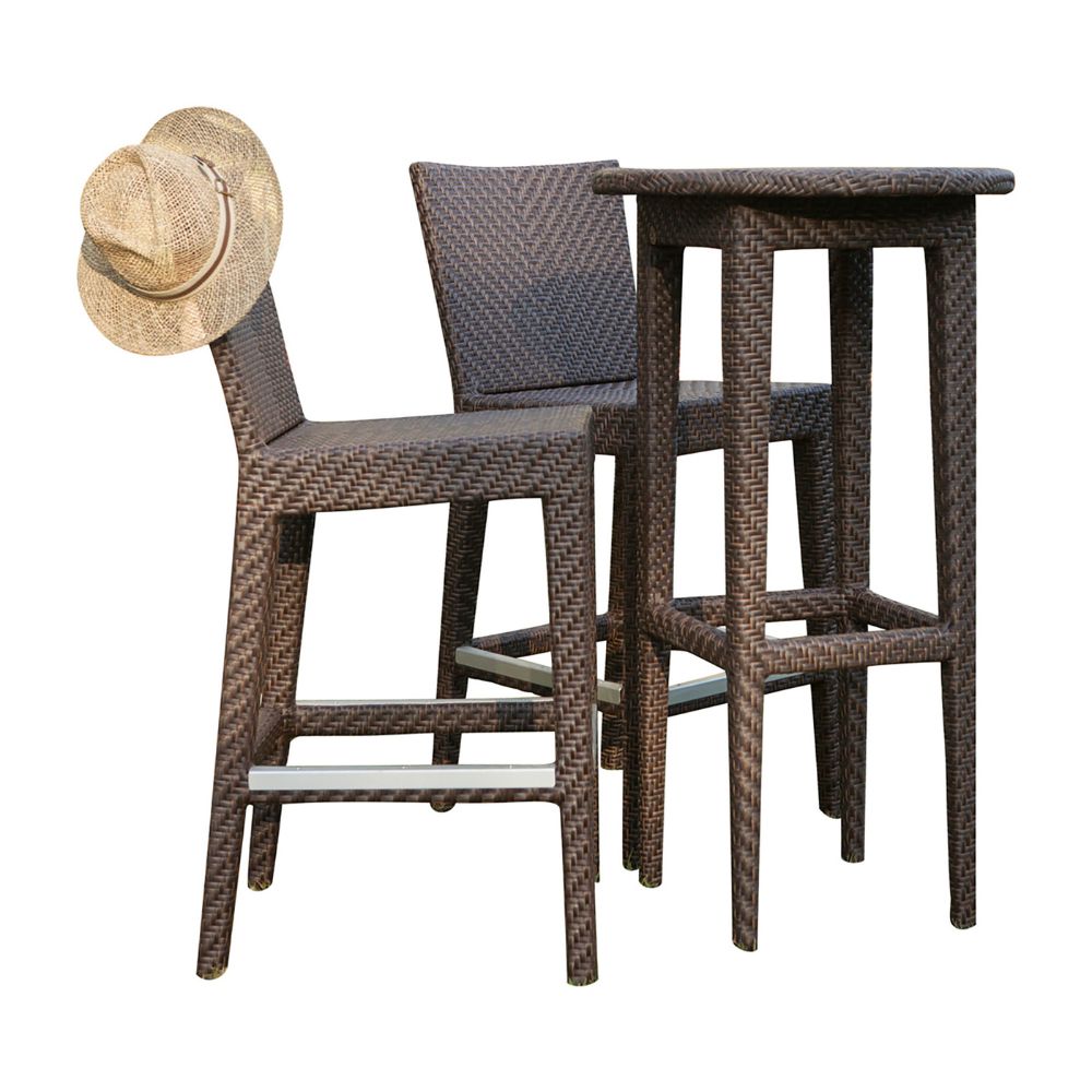 Wicker outdoor bar set with two stools and a small table on a white background