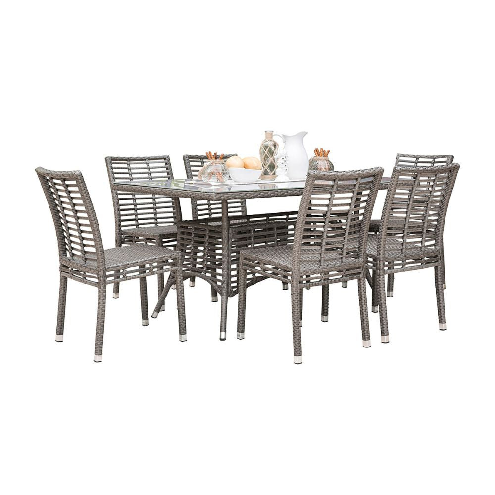 Outdoor dining set with a table and four chairs on a white background