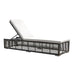 Black metal outdoor lounge chair with white cushion on a white background